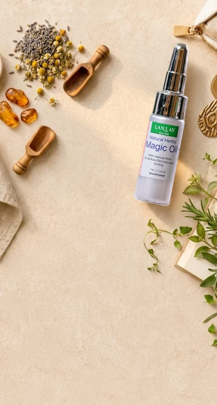 Vita-X Magic Oil with herbs on a warm stone surface